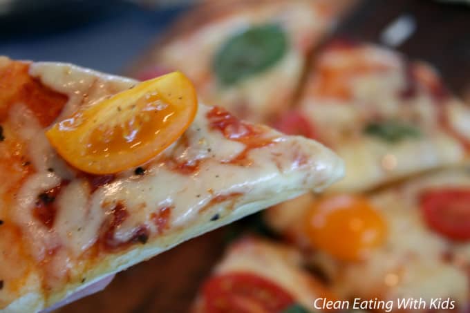 Two ingredient pizza dough using plain flour and yogurt gives a 'thin crust' pizza.
