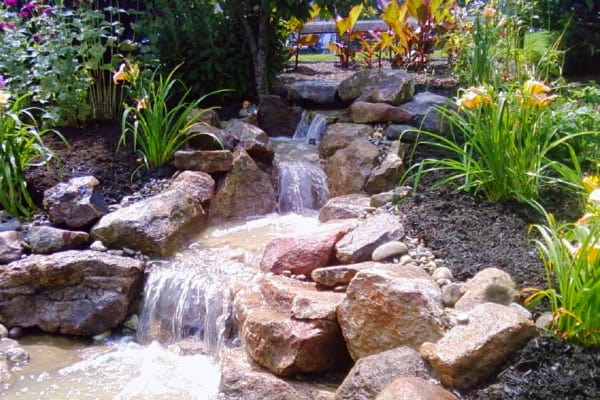 23 Absolutely Gorgeous Pondless disappearing waterfall designs for your backyard