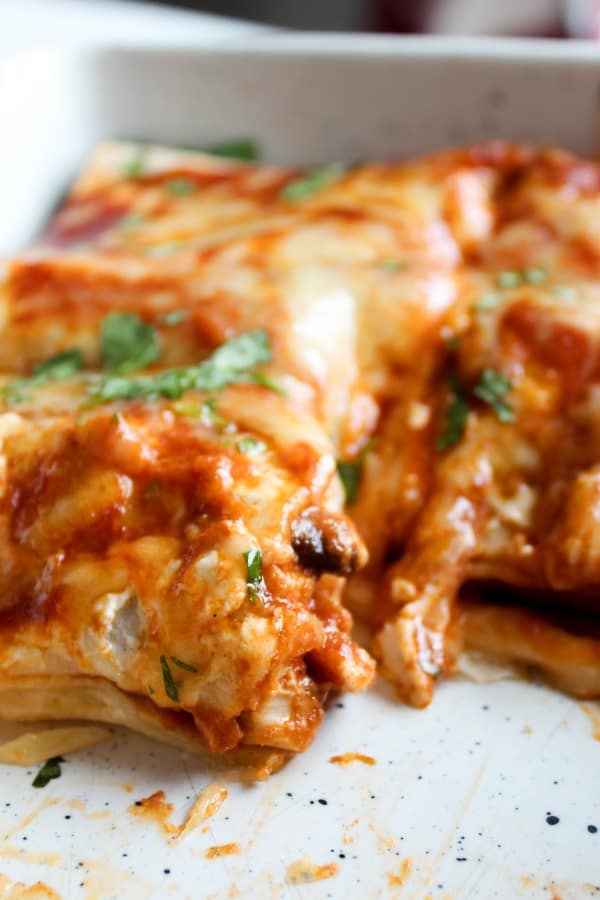 Healthy chicken enchiladas with black beans and corn. 