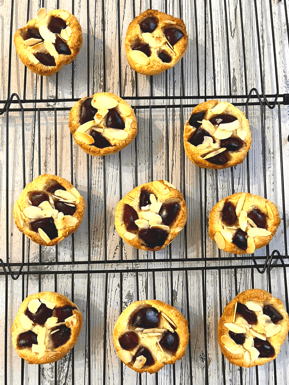 cookies made with fresh cherries on a cooling rack 